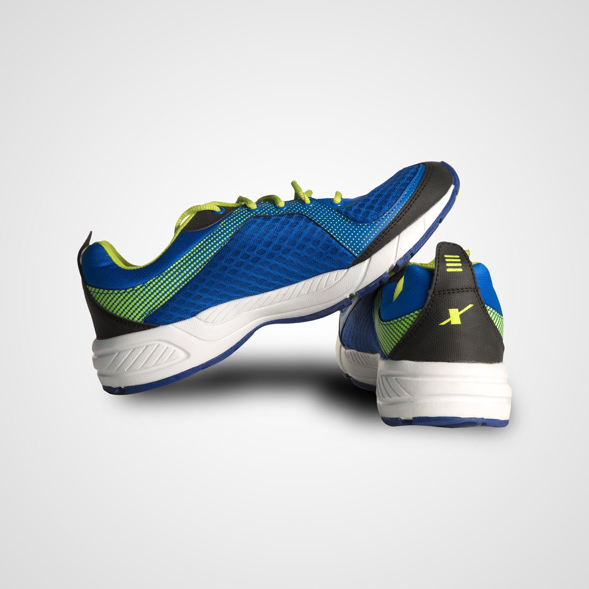 Navy athletic-style men’s walking shoes shown from two angles