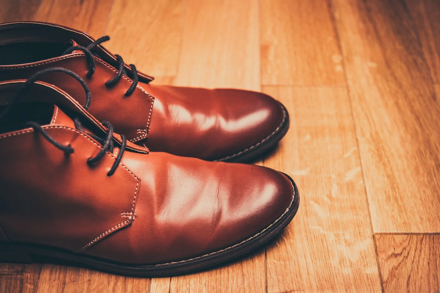 Pair of brown leather boots illustrating everyday leather footwear care