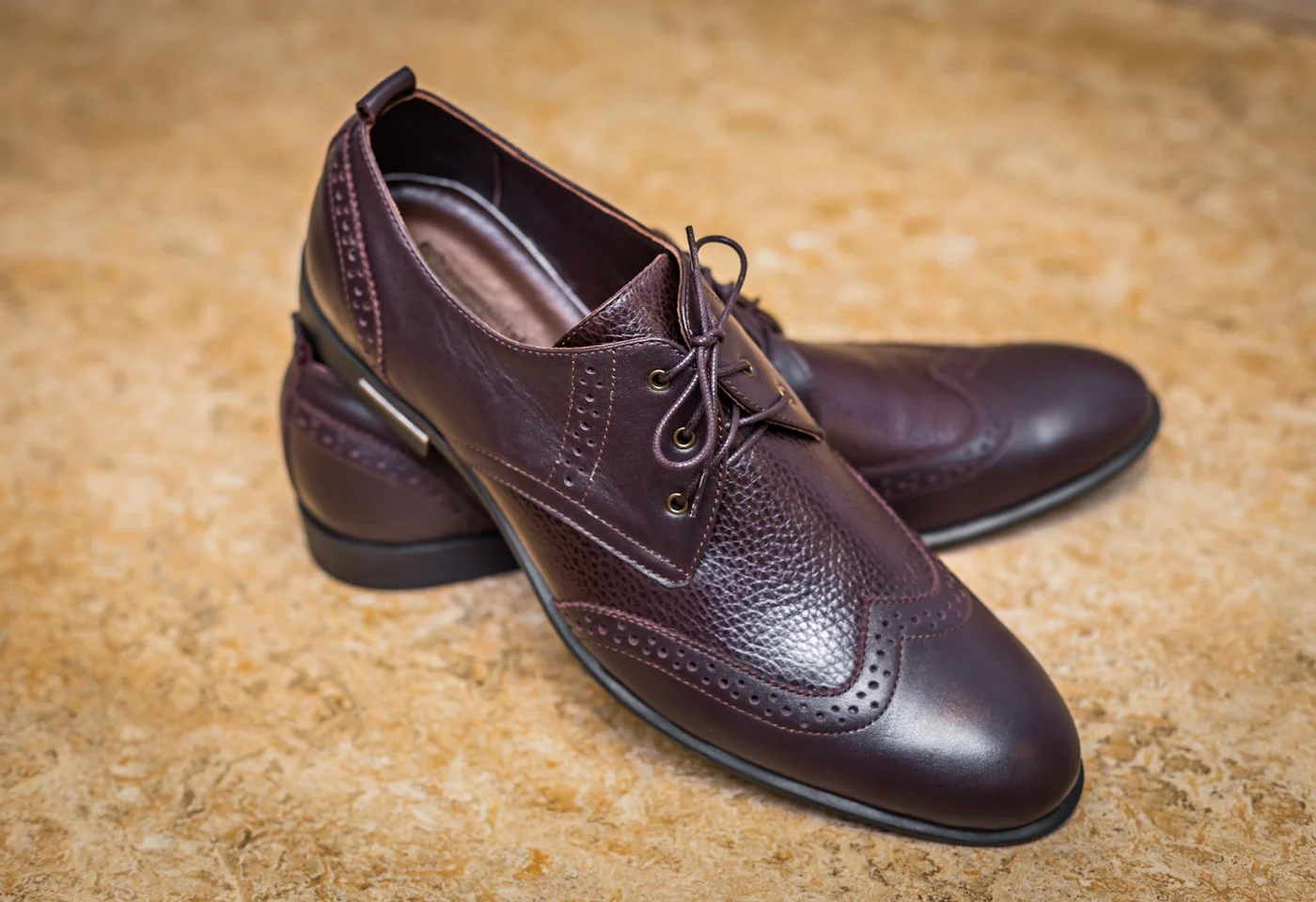 Close-up of brown leather brogue shoes ready for cleaning and conditioning