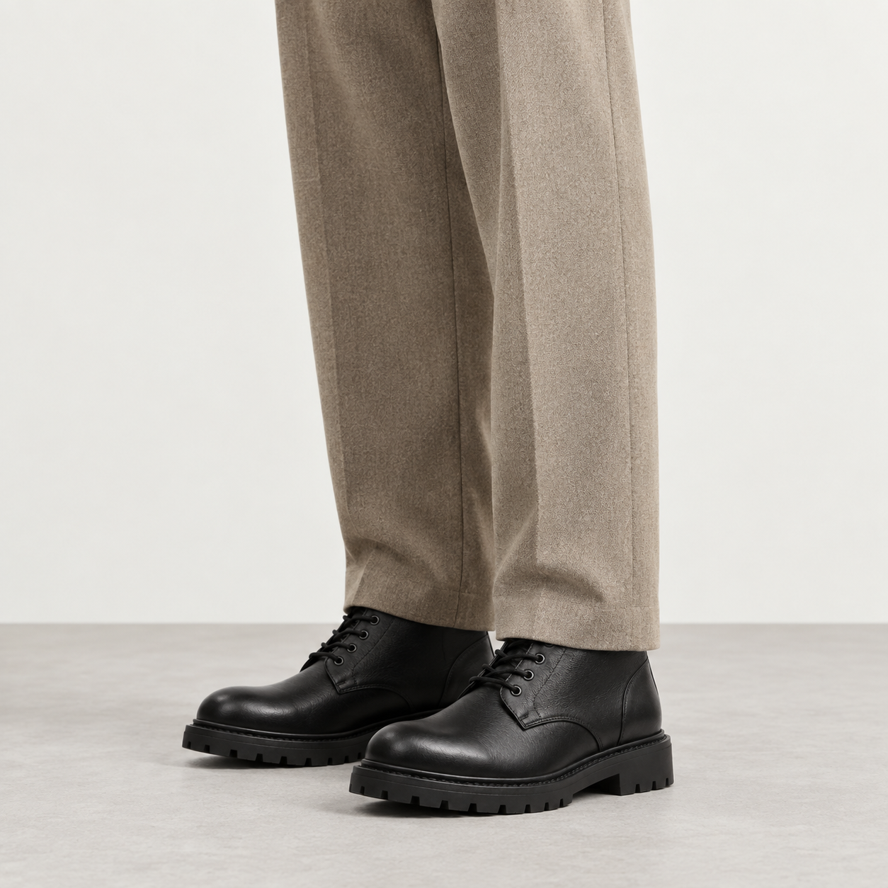 Black Chunky Lace-Up Boot worn with trousers