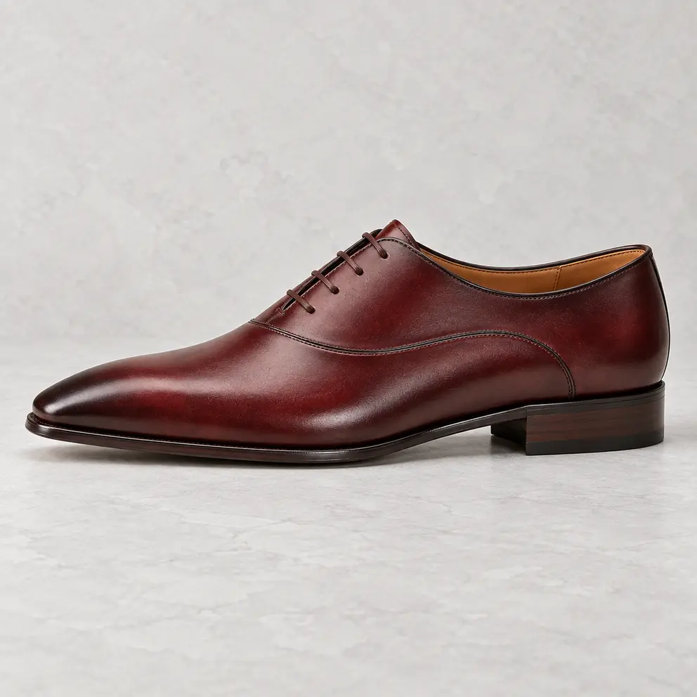Oxblood Oxford with asymmetric detail, side view