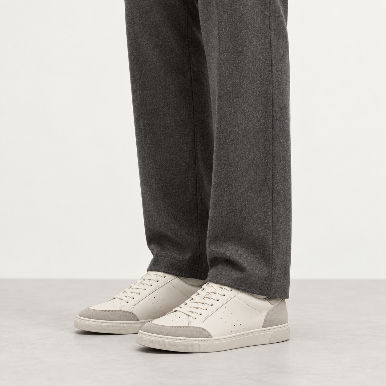 Ivory Court Sneaker worn with trousers