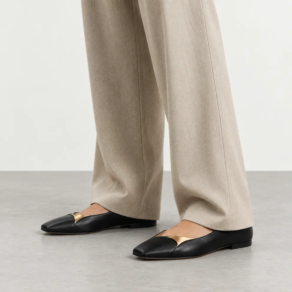 Black Sculpted Square-Toe Flat worn on foot